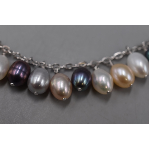 121 - Sterling Silver and Coloured Pearl Bracelet New With Tag in Presentation Box