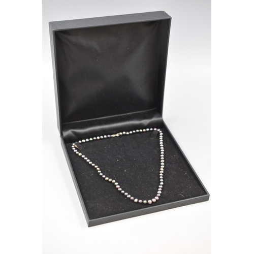 283 - Sterling Silver and Coloured Pearl Necklace In Presentation Box