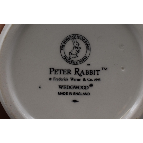 483 - Four Pieces of Wedgwood Peter Rabbit Ceramics, Includes Plate, Bowl and Two Cups.