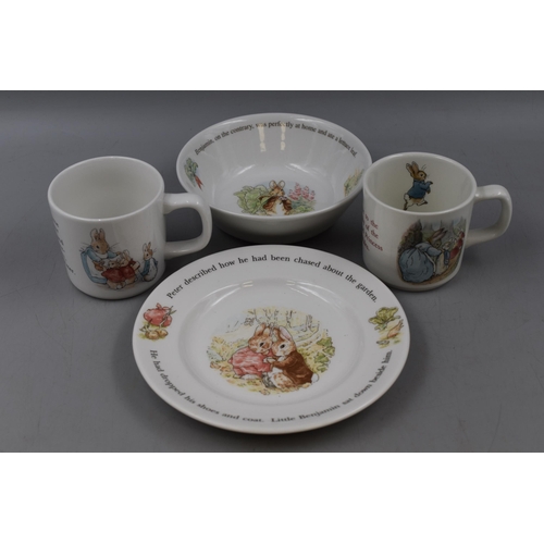 483 - Four Pieces of Wedgwood Peter Rabbit Ceramics, Includes Plate, Bowl and Two Cups.