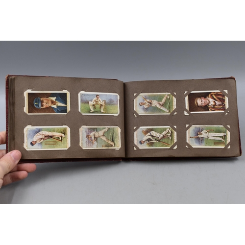 488 - Four Vintage Leather Wallets, With A Leather Wallet Containing a Selection of cigarette Cards.