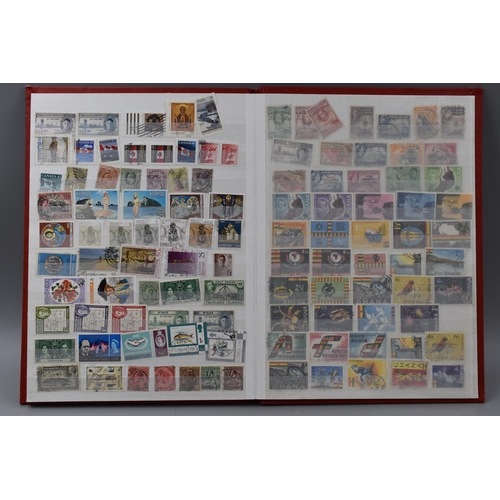 496 - Album containing a selection of commonwealth stamps