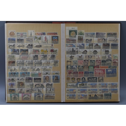 497 - Album containing a selection of German and Switzerland Stamps