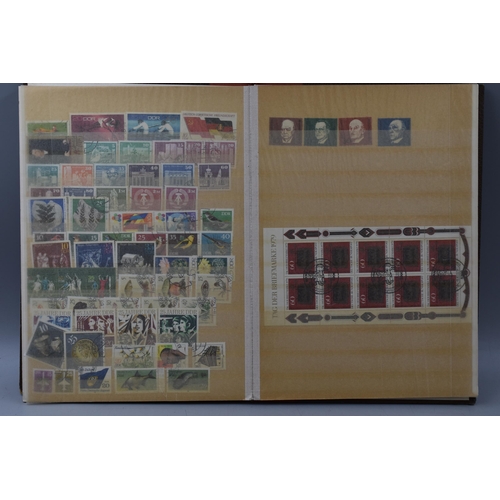 497 - Album containing a selection of German and Switzerland Stamps