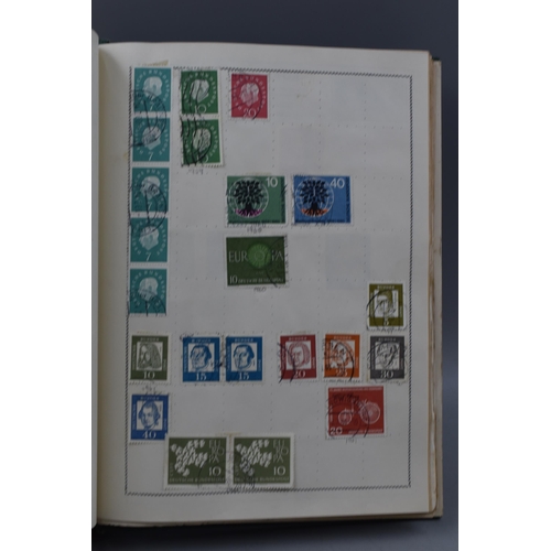 499 - Movaleaf Worldwide Stamp Album Containing a Large Selection of Great Britian, Hong Kong, Indian and ... 