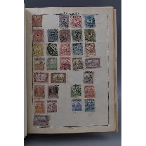 499 - Movaleaf Worldwide Stamp Album Containing a Large Selection of Great Britian, Hong Kong, Indian and ... 