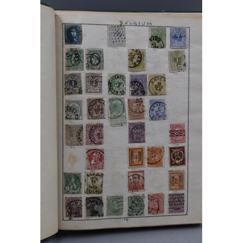 499 - Movaleaf Worldwide Stamp Album Containing a Large Selection of Great Britian, Hong Kong, Indian and ... 