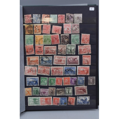 502 - Album containing a selection of commonwealth stamps including Australia, New Zealand, Canada, Nigeri... 