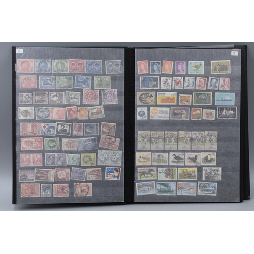 502 - Album containing a selection of commonwealth stamps including Australia, New Zealand, Canada, Nigeri... 