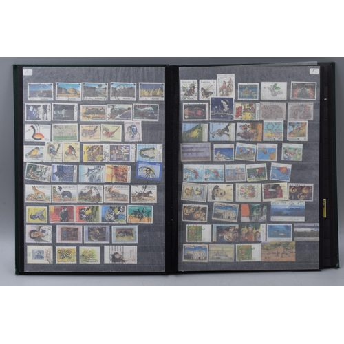 502 - Album containing a selection of commonwealth stamps including Australia, New Zealand, Canada, Nigeri... 