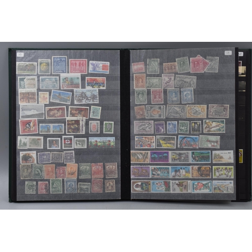 502 - Album containing a selection of commonwealth stamps including Australia, New Zealand, Canada, Nigeri... 