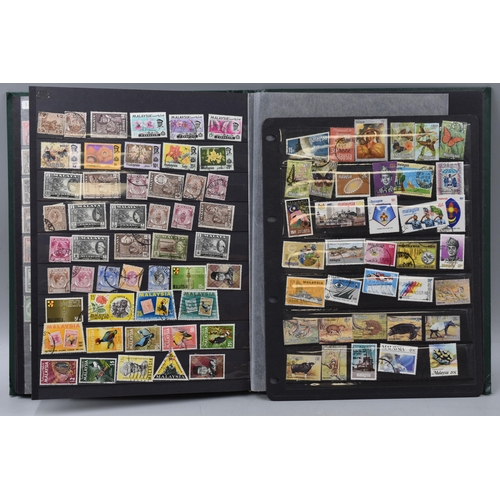 502 - Album containing a selection of commonwealth stamps including Australia, New Zealand, Canada, Nigeri... 