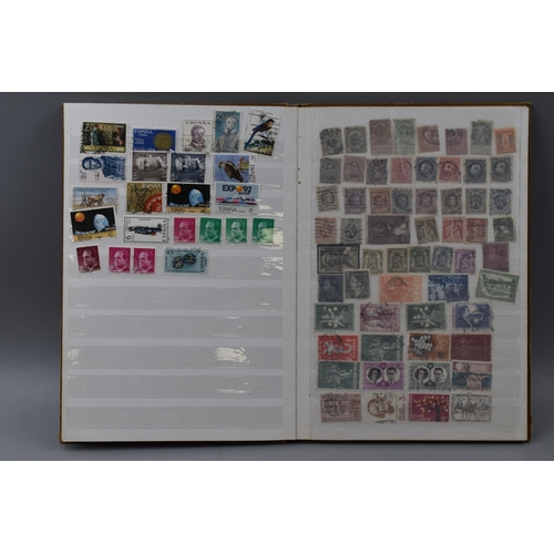 503 - Album containing a selection of worldwide stamps including Vatican, Austria, Spain, Belgium, Monaco,... 