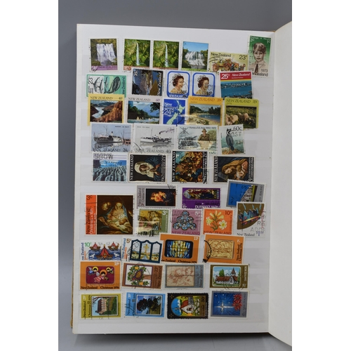 503 - Album containing a selection of worldwide stamps including Vatican, Austria, Spain, Belgium, Monaco,... 