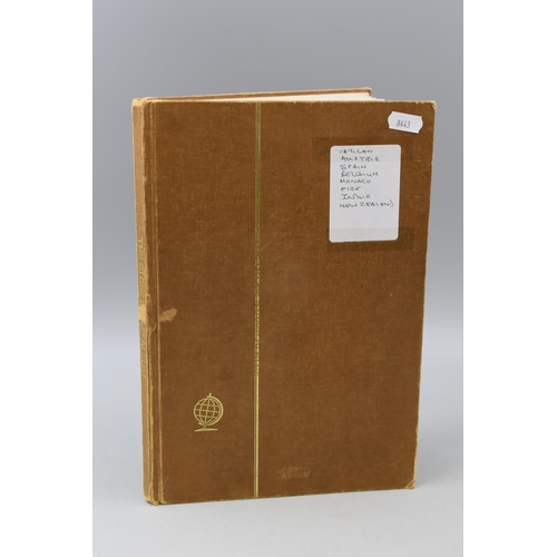 503 - Album containing a selection of worldwide stamps including Vatican, Austria, Spain, Belgium, Monaco,... 