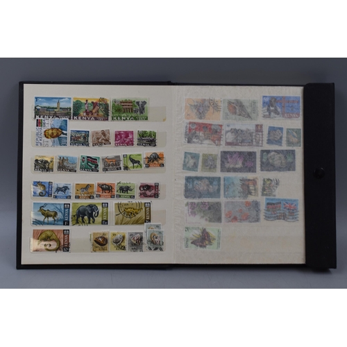 504 - Netto Album containing a selection of stamps from Commonwealth Countries including Kenya, Rhodesia, ... 