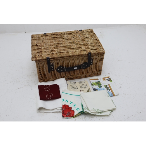 677 - Large Wicker Picnic Basket with contents to include Table Covers and T-Towels