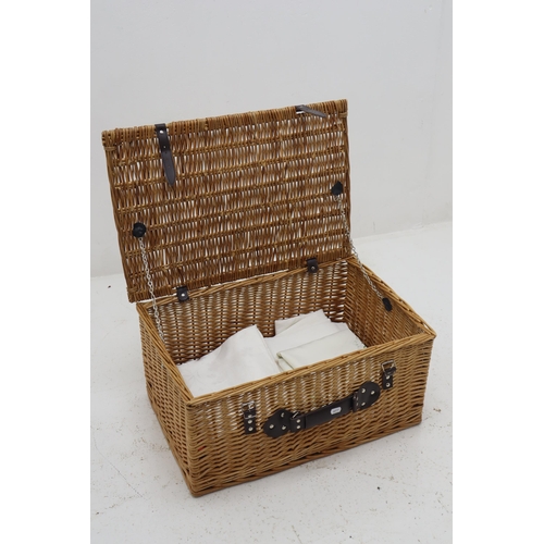 677 - Large Wicker Picnic Basket with contents to include Table Covers and T-Towels