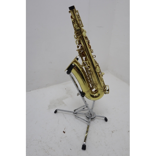 590 - A John Packer 041 Alto Saxophone, With Case and Accessories. Also Includes Music Stand and Saxophone... 