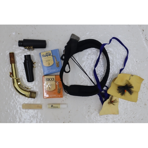 590 - A John Packer 041 Alto Saxophone, With Case and Accessories. Also Includes Music Stand and Saxophone... 