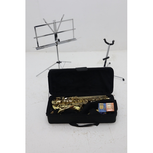 590 - A John Packer 041 Alto Saxophone, With Case and Accessories. Also Includes Music Stand and Saxophone... 