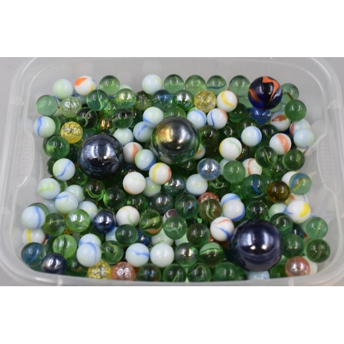 593 - A Tub With a Large Selection of Glass Marbles.