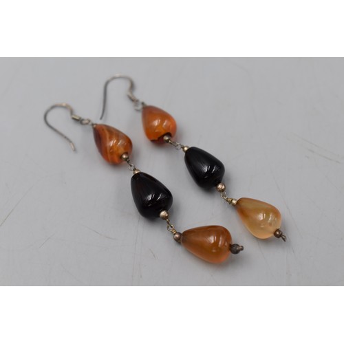 25 - Pair of Silver 925 amber and black stoned drop earrings in presentation case