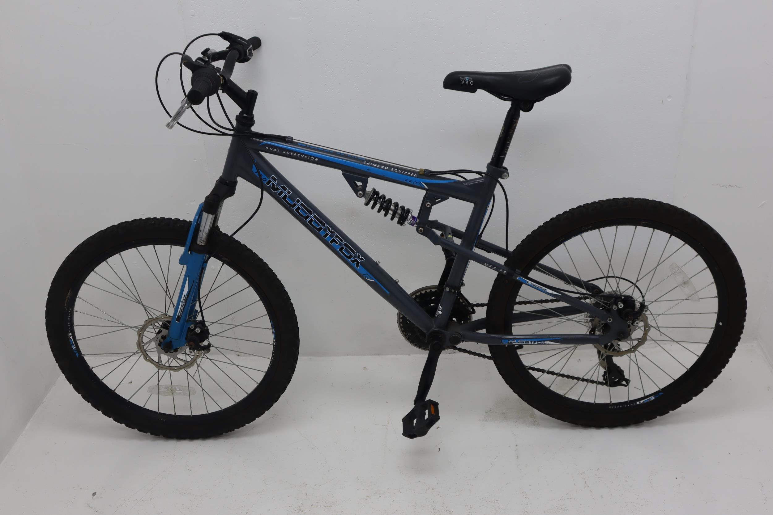 A MuddyFox MFX Pro Mountain Bike Shimano Equipped Dual Suspension and 24 Wheels