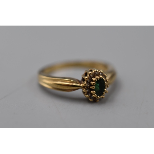 1 - A 9ct Gold Green and Clear Stoned Ring, Size O. In Presentation Box.