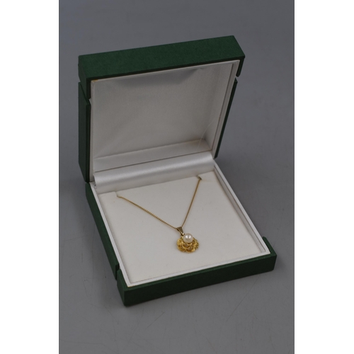 6 - Gold 9ct Chain with Floral Pearl Mounted Pendant Complete with Presentation Box