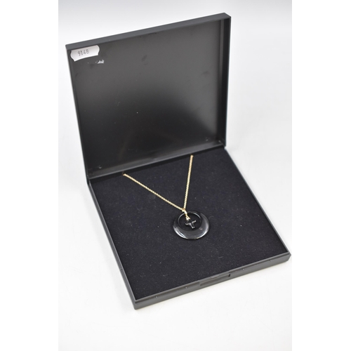 7 - Gold 375 (9ct) Chain with Black Cross Pendant complete with Presentation Box