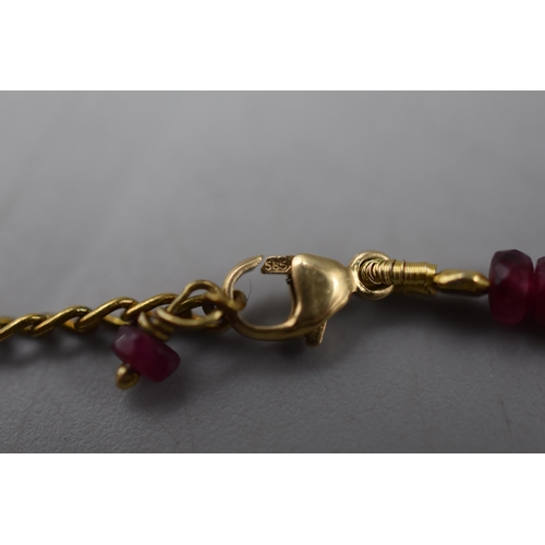 32 - Gold 585 Necklace With Purple Stones. Safety Chain Needs Repair