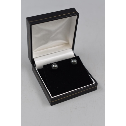 77 - Pair of 18ct Gold Black Pearl Earrings Complete with Presentation Box