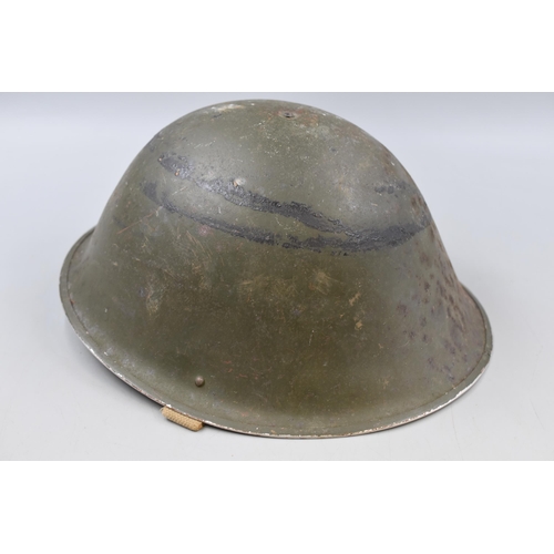 319 - British Military Helmet with Tags