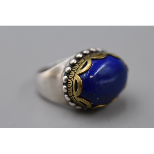 106 - Silver 925 Ring with Large Blue Stone in Brass Mount (Size O) Complete with Presentation Box