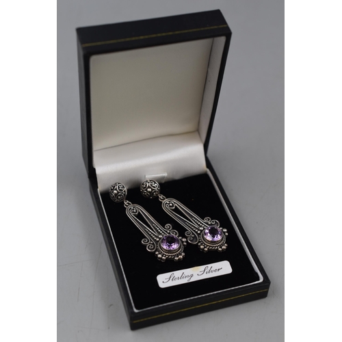 127 - Pair of Surati Silver 925 Byzantine Stile Amethyst stoned Earrings complete with presentation Box