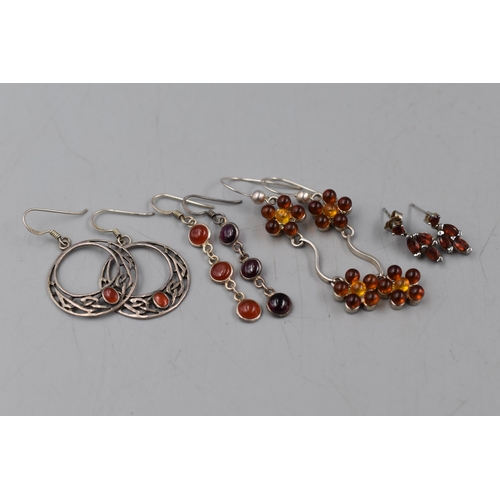 129 - Four Pairs of Silver 925 Amber Stoned Sarrings