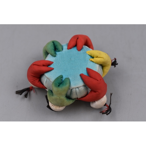 194 - A Vintage Chinese Silk Six Boy Pin Cushion.