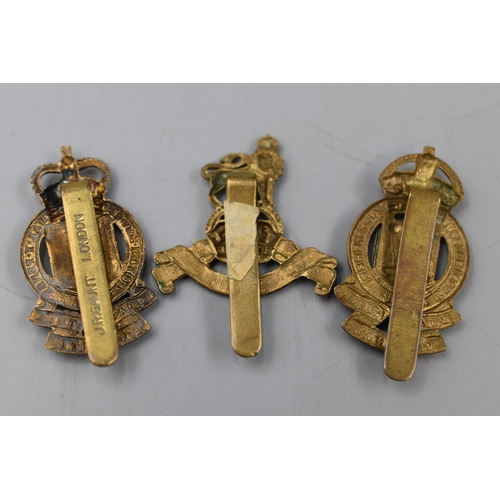 229 - Three Military Cap Badges including Royal Artillary