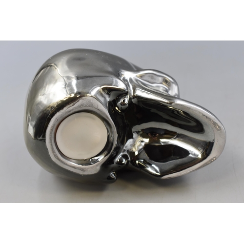 245 - Ceramic Glazed Metallic Style Skull Money Box with Stopper approx 7