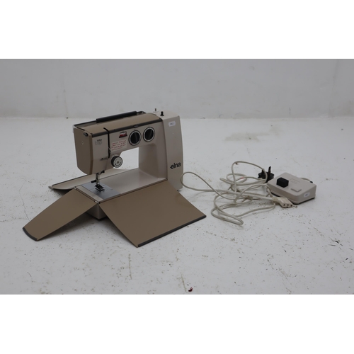 538 - Elna Lotus tsp Electric Sewing Machine with Footswitch, and booklets