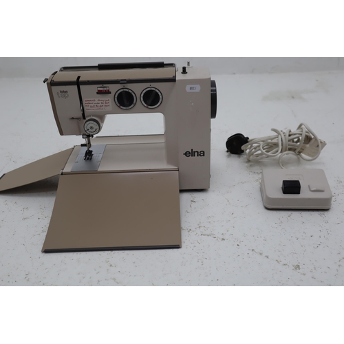 538 - Elna Lotus tsp Electric Sewing Machine with Footswitch, and booklets