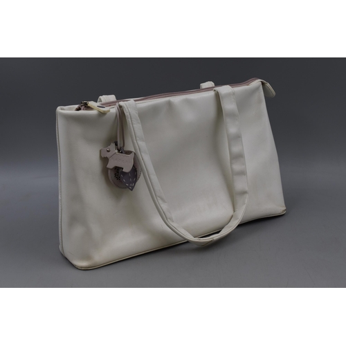 444 - A Radley White Leather Handbag, With Tags.