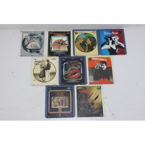 458 - Selection of 9 CED Videodiscs including Charlie Chaplin The Great Dictator Earth Wind and Fire, The ... 