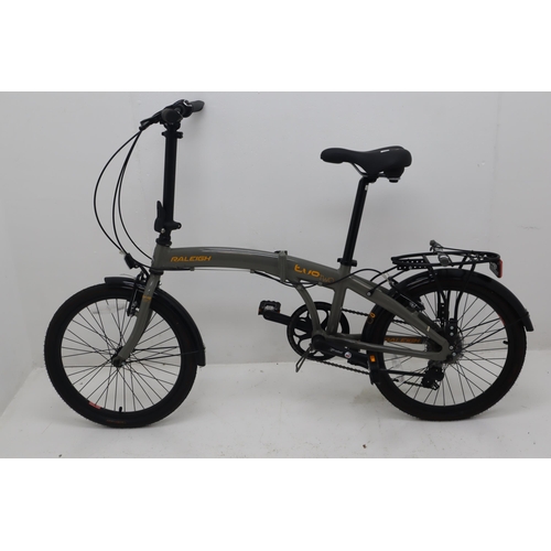 588 - Raleigh Lightweight Evo-2 Folding Commuter Bike 7 Speed, Rear Carry Rack, Pump in great Condition, l... 