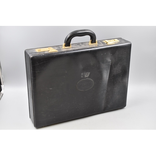 656 - An Amiet Black Leather Dual Combination Lock Briefcase.