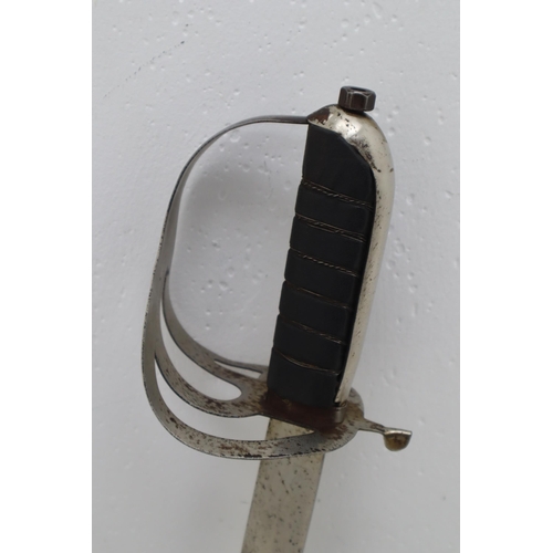 241 - Two British Style Cavalry Military Swords in the 1854 Pattern includes one complete with sheath