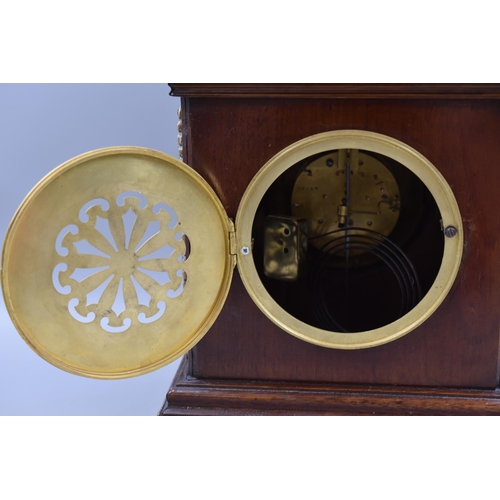 270 - Antique Bracket Clock in Dark Wooden Casing Decorated woth Brass Fittings and a Beveled Edge Crystal... 