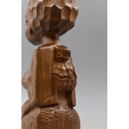 273 - Three Hand Carved Wooden Sculptures, Includes Dolphin, Ethnic Female Figure, And Embracing.