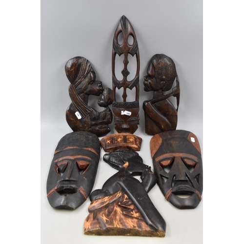 274 - Six Pieces of Hand Carved Wooden Ethnic Wall Hanging Masks and Faces.